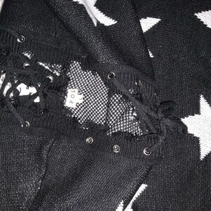POL Star Pattern Black and White Sweater with criss cross Laced neck design